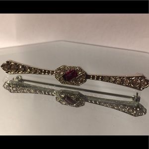 Antique silver brooch w/clear crystals and red gem